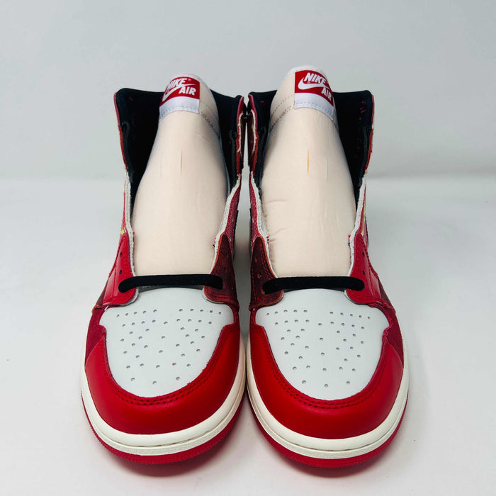 Jordan 1 High Spider-Man sneaker with red and black web-like detailing on display box.