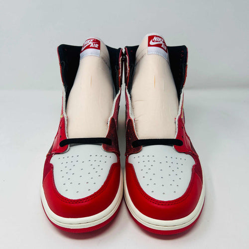 Jordan 1 High Spider-Man sneaker with red and black web-like detailing on display box.