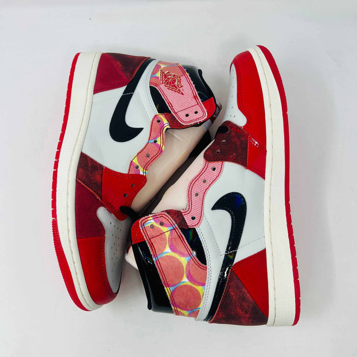 Jordan 1 High Spider-Man sneaker with red and black web-like detailing on display box.