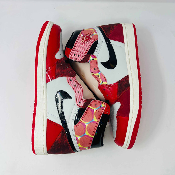 Jordan 1 High Spider-Man sneaker with red and black web-like detailing on display box.