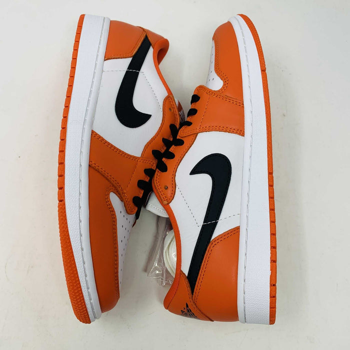 A pair of BRAND NEW Jordan 1 Low Starfish sneakers is displayed, viewed from the front. The orange and white shoes have black laces, a perforated white toe box, and the 100% Authentic Jordan logo is visible on the tongue.