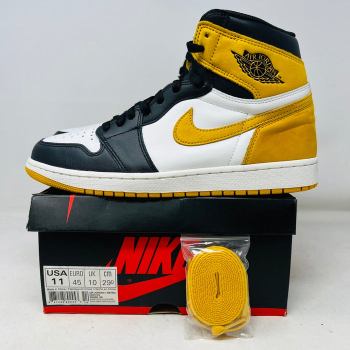 Jordan 1 Retro High Yellow Ochre sneaker on box with extra yellow laces, black white and yellow colorway, 2018 model