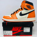 Jordan 1 Retro Reverse Shattered Backboard sneaker in orange, black, and white on Nike box from 2016