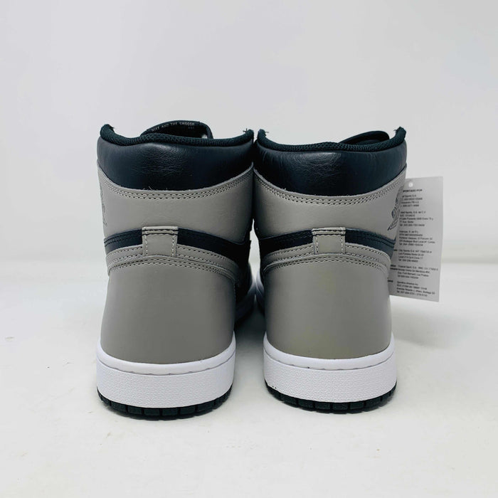 Jordan 1 Shadow 2018 sneakers with grey laces on a Nike box. Brand new condition.