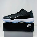 Jordan 11 Low Space Jam sneaker brand new 2024 black and white on Nike Air box