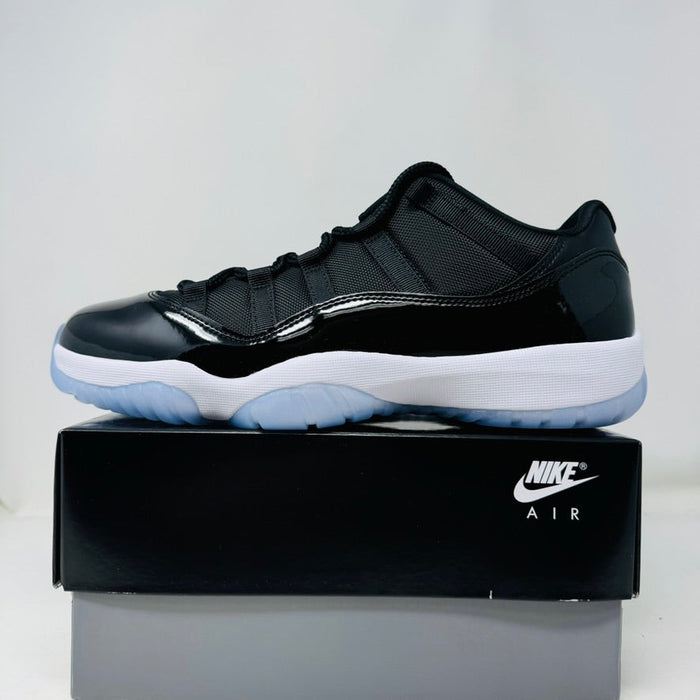 Jordan 11 Low Space Jam sneaker brand new 2024 black and white on Nike Air box