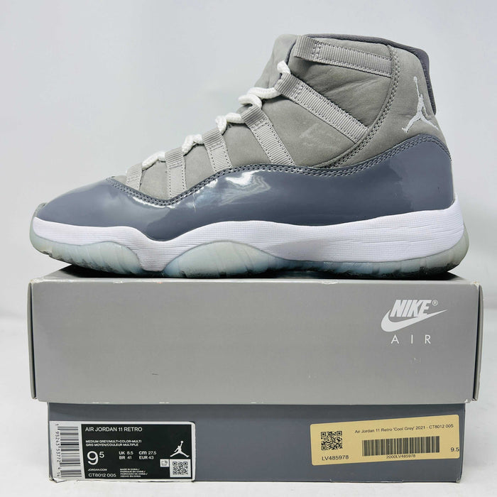 Jordan 11 Retro Cool Grey 2021 sneaker on Nike Air box with grey and white design