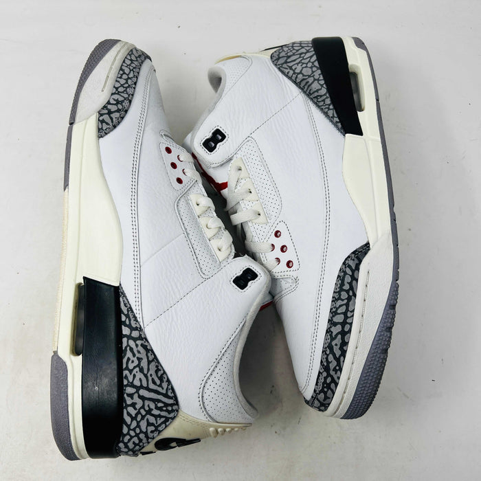 Jordan 3 Retro White Cement Reimagined sneaker on Nike box, 2023 release.