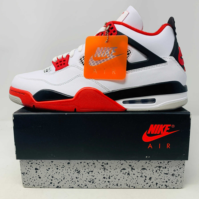 Jordan 4 Fire Red sneaker in white, red, and black on Nike Air box, brand new 2020 edition