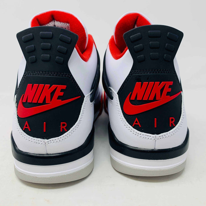 The Jordan 4 Fire Red sneaker in white, red, and black is brand new and authentic, featuring mesh details, a visible air unit in the sole, and a Nike Air tag on the laces. It comes in a box with a speckled gray design and red Nike Air logo.