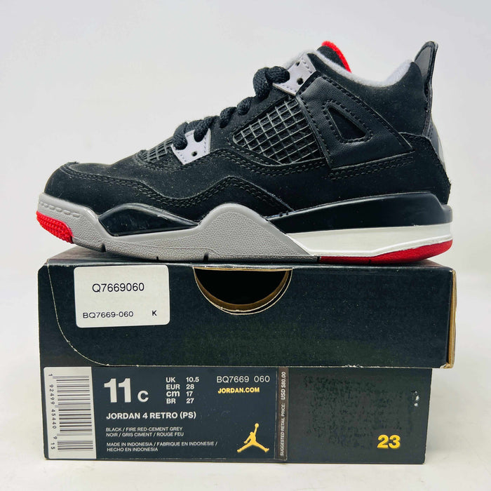 Jordan 4 Retro Bred 2019 sneakers in good condition with slight heel drag and clean uppers