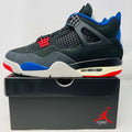 Jordan 4 Retro Rare Air sneaker in black, blue, red, and white on box with red Jumpman logo