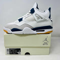 Jordan 4 Retro SB Navy sneaker with white, navy, and grey color on Nike SB box, 2023 model