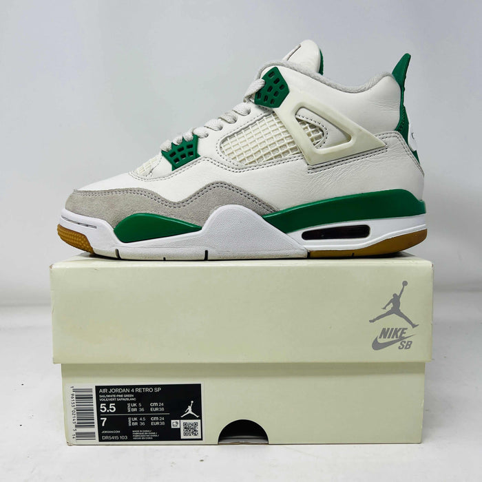 Jordan 4 Retro SB Pine Green sneaker on box with white, green, and gray colorway, 2023 release