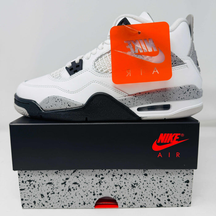 Jordan 4 Retro White Cement 2025 GS sneaker on box with Nike Air tag