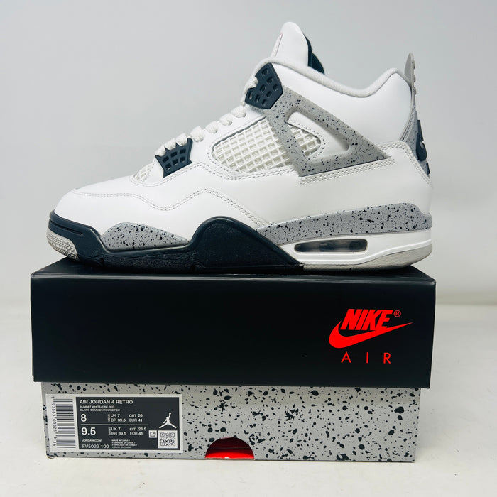 Jordan 4 Retro White Cement sneaker on box with clean uppers and speckled midsole 2025 edition