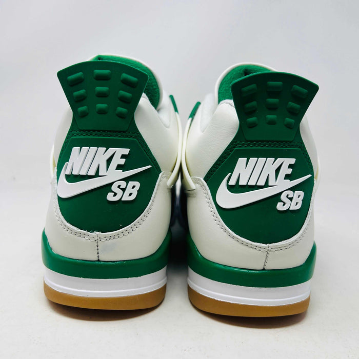 Back view of the Jordan 4 SB Pine Green by Jordan sneakers in white and green, featuring logos on the heel, a gum-colored sole, and detailed heel tab patterning.
