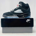 Jordan 5 Retro OG Black Metallic sneaker on Nike Air box in near-new condition