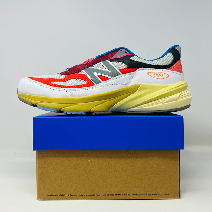 New Balance 990v6 MiUSA Action Bronson sneaker with colorful design on blue and brown box.