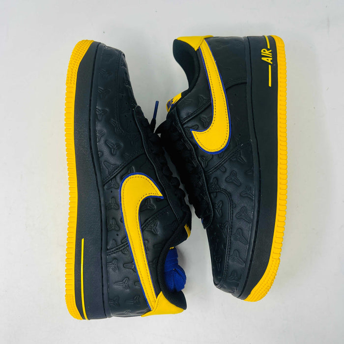 Brand new Nike Air Force 1 Low Kobe Bryant Lakers Away sneaker in black with yellow and blue accents, featuring embossed details. Displayed on a white box with a yellow Nike logo and Kobe Bryant symbol. Limited edition of 8000, ideal for those seeking standout accessories.