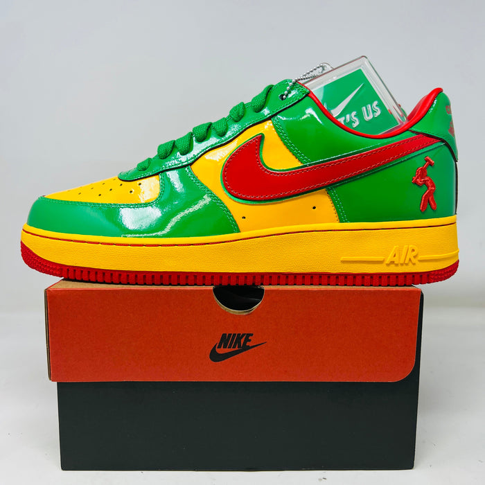 Nike Air Force 1 Low sneaker in Lucky Green, yellow, and red with Concrete Boys design on box