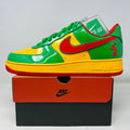 Nike Air Force 1 Low sneaker in Lucky Green, yellow, and red with Concrete Boys design on box