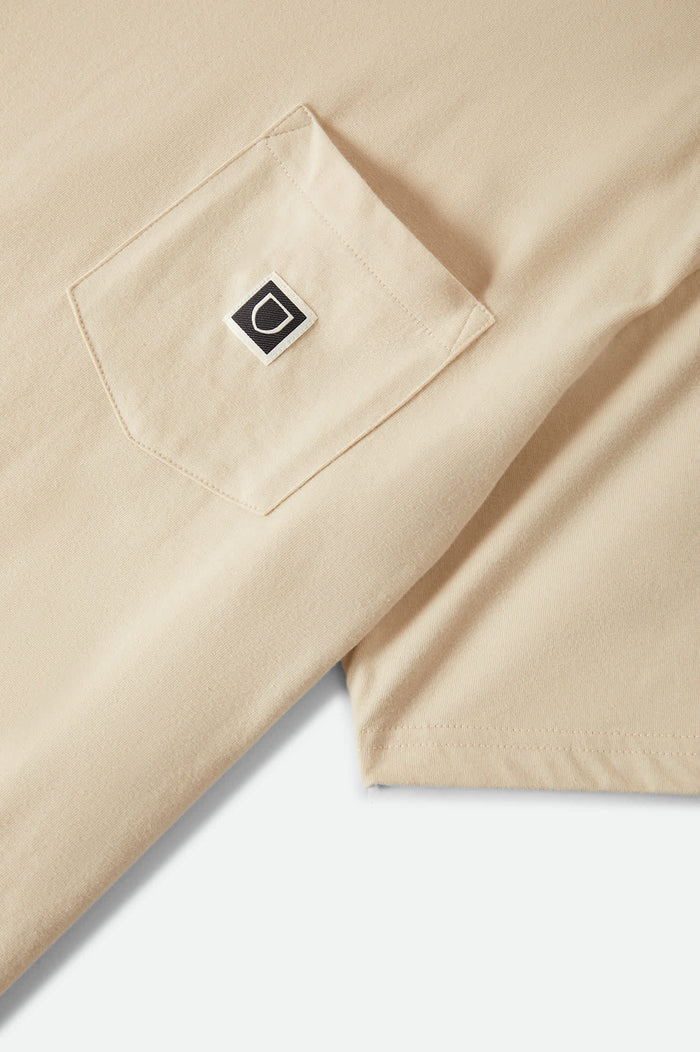 Men's Beta Sheild Short Sleeve Pocket T-Shirt in the color Cream - Additional Laydown image
