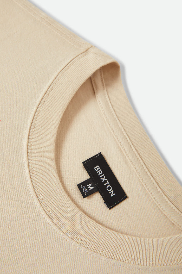 Men's Beta Sheild Short Sleeve Pocket T-Shirt in the color Cream - Additional Laydown image
