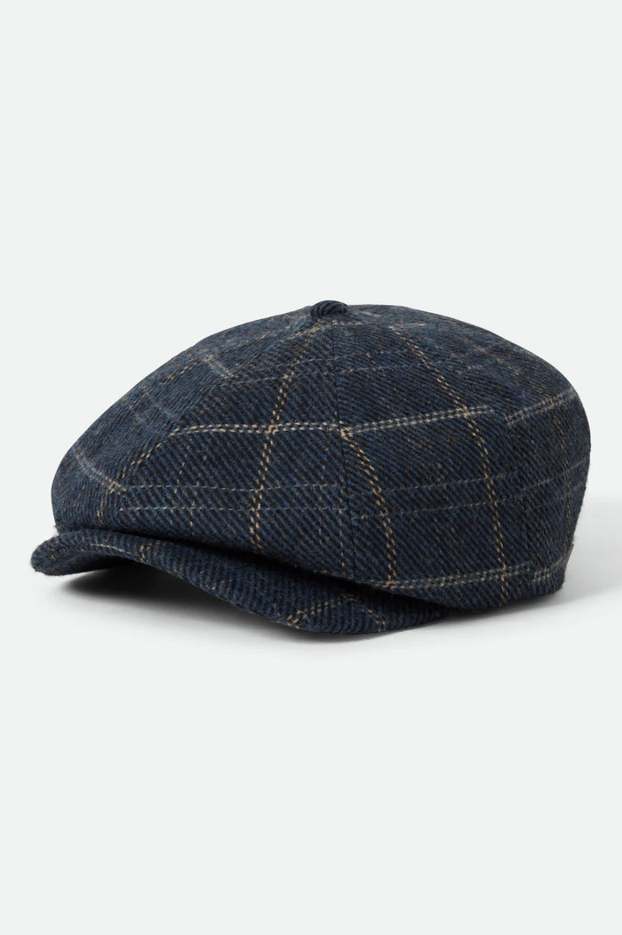 Unisex Brood Newsboy Cap in the color Mood Indigo/Tan - Front Product View