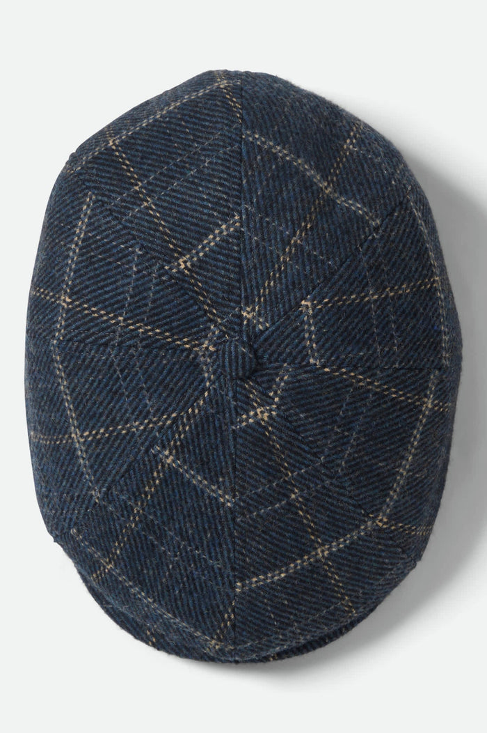 Unisex Brood Newsboy Cap in the color Mood Indigo/Tan - Additional Laydown image