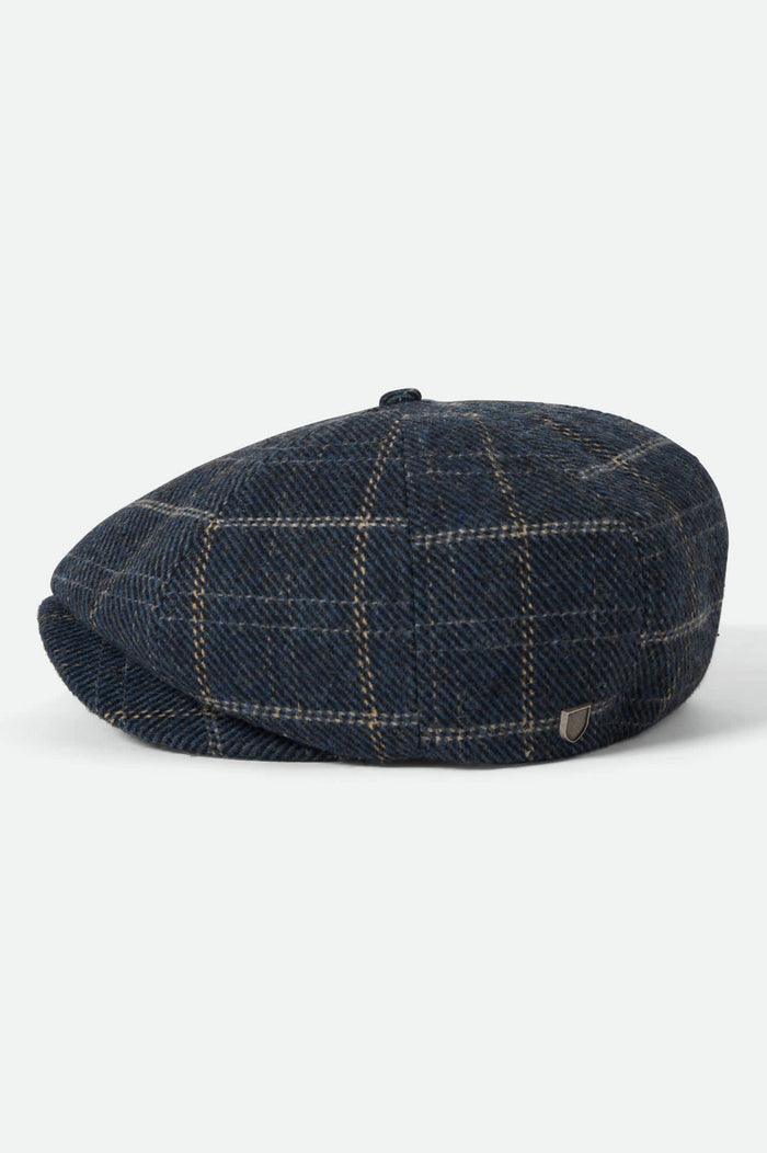 Unisex Brood Newsboy Cap in the color Mood Indigo/Tan - Additional Laydown image