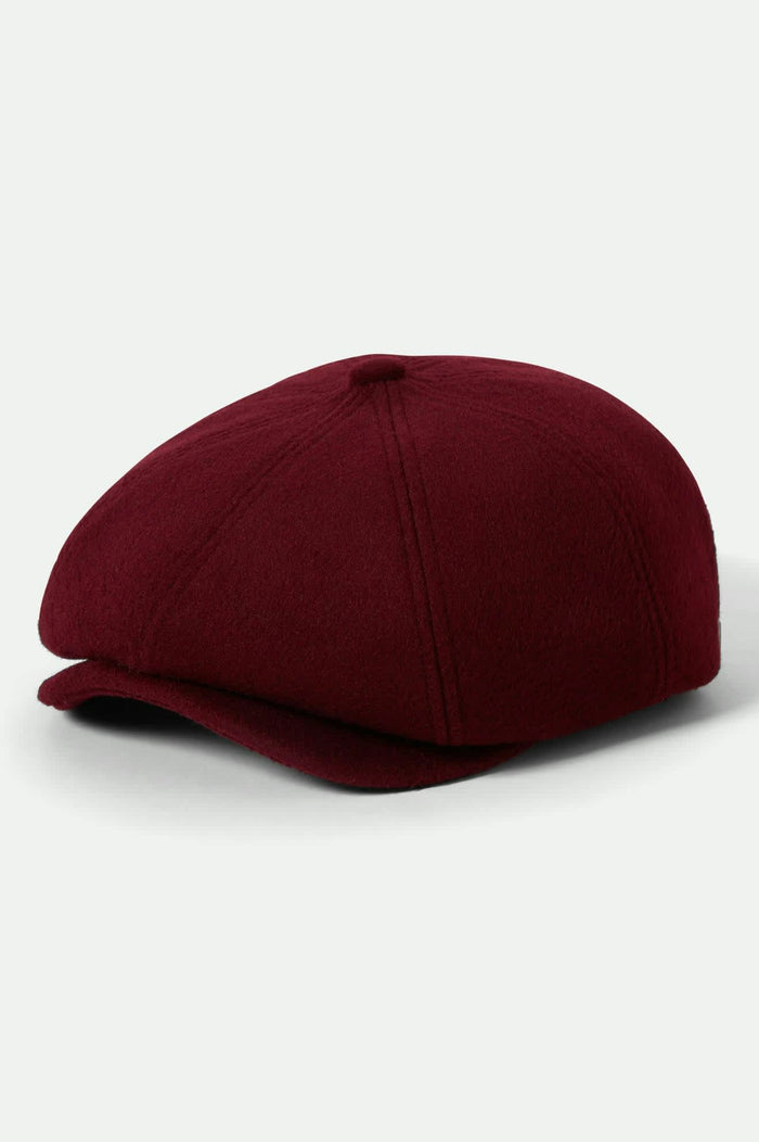 Unisex Brood Newsboy Cap in the color Port - Front Product View