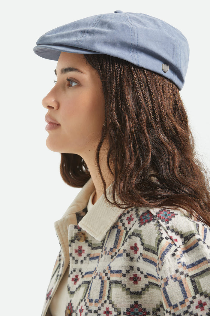 Unisex Brood Newsboy Cap in the color Slate Blue Brushed Satin - Women's Side View