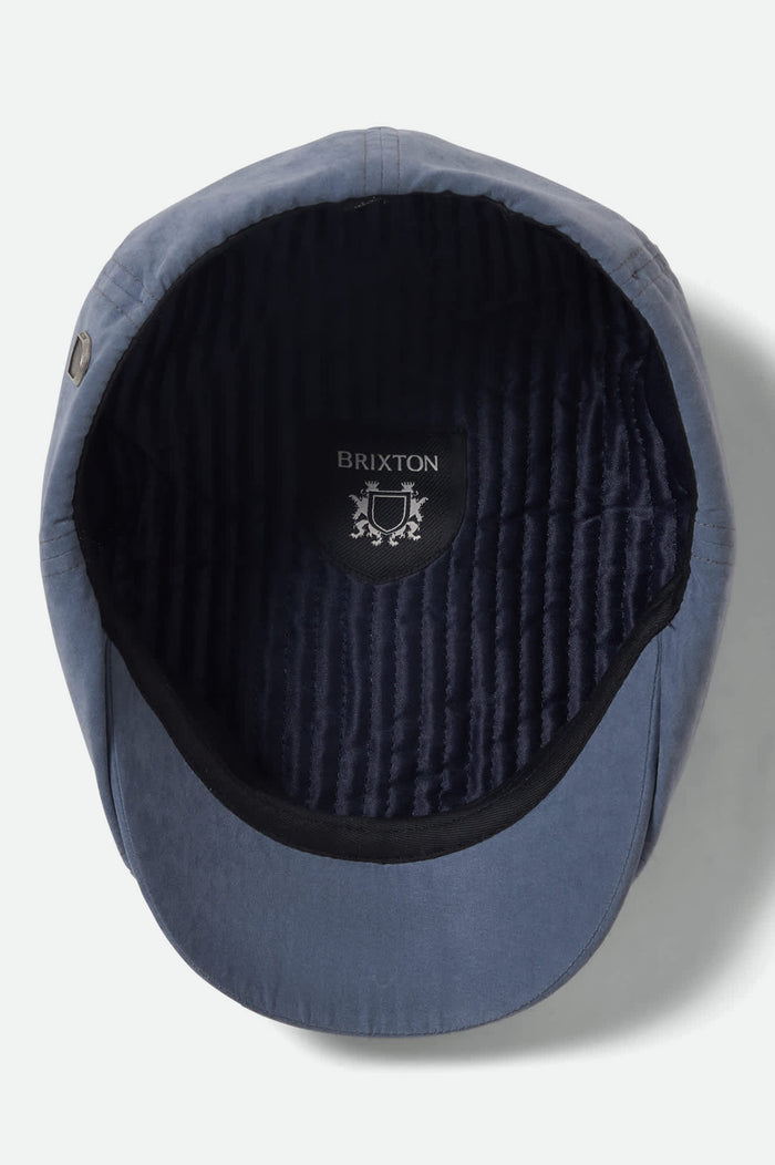 Unisex Brood Newsboy Cap in the color Slate Blue Brushed Satin - Additional Laydown image