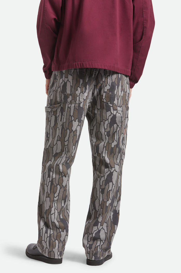 Men's Builders Carpenter Stretch Pant in the color Bark Camo - Men's Back View