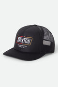 Unisex Caldwell Netplus Trucker Hat in the color Black/Black - Front Product Laydown Image