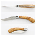 Capuchadou 12 cm Classic Folding Knife - Amboyna Burl, close-up of the handle with visible wood grain and metal accents. Handcrafted details, 100% Made in France.