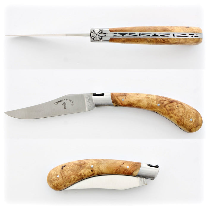 Capuchadou 12 cm Classic Folding Knife - Amboyna Burl, close-up of the handle with visible wood grain and metal accents. Handcrafted details, 100% Made in France.
