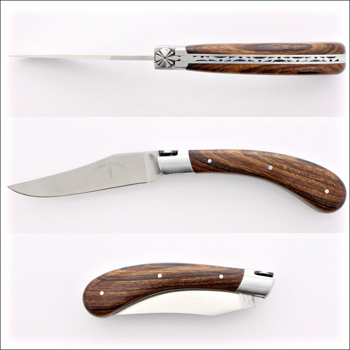 Capuchadou 12 cm Classic Folding Knife - Desert Ironwood. Top-down view of the open knife, highlighting the dark wood handle and polished blade. Handcrafted details, 100% Made in France.