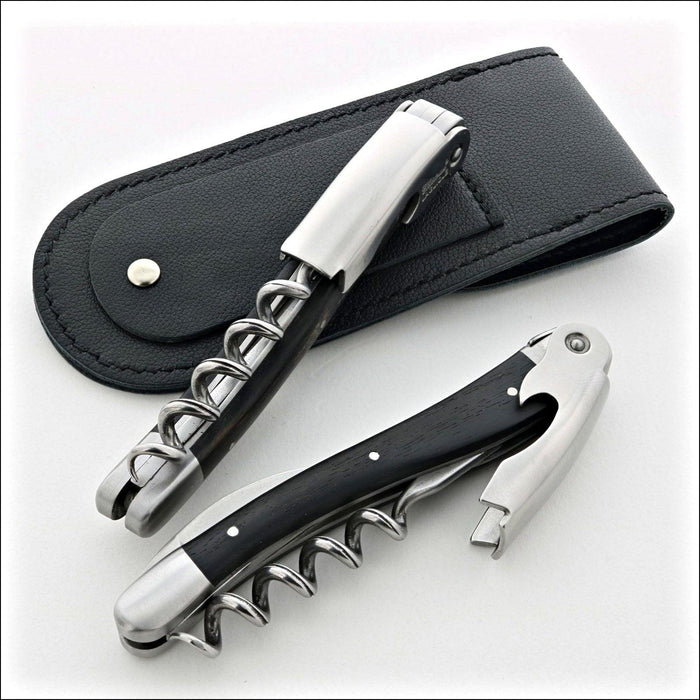 Chateau Laguiole Classic Ebony Corkscrew, close-up of two corkscrews with a black leather case. Handcrafted details, 100% Made in France.