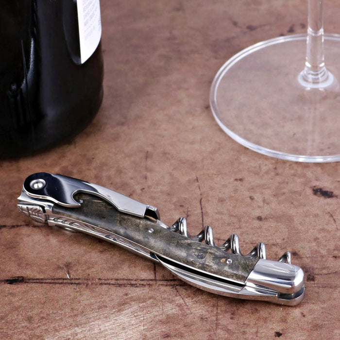 Chateau Laguiole Classic Grey Buckeye Burl Corkscrew, close-up of handle. Handcrafted details, 100% Made in France.