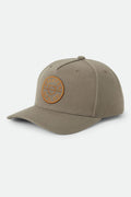 Unisex Crest Snapback in the color Dark Olive/Caramel - Front Product Laydown Image
