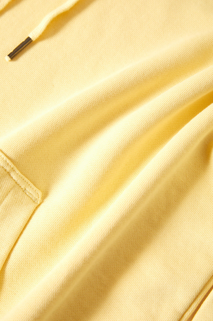 Women's Cross Loop French Terry Hoodie in the color Panna Cotta - Additional Laydown image