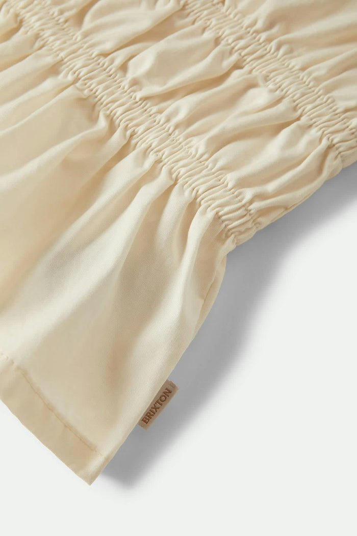 Women's Eden Smocked Top in the color Off White - Additional Laydown image