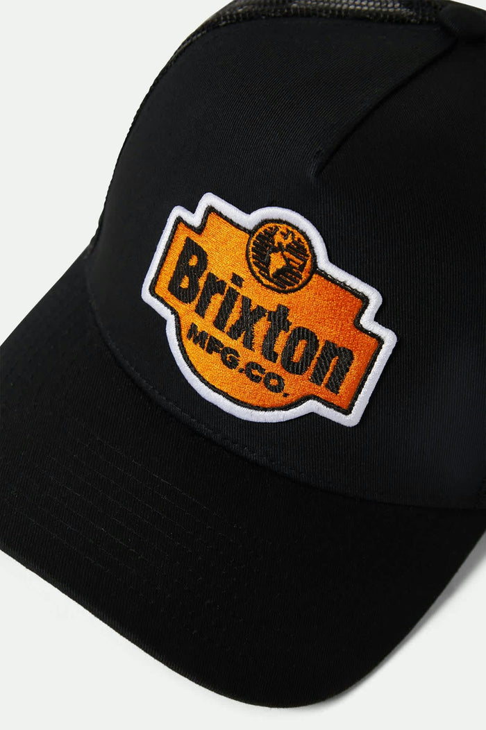 Unisex Genuine Quality Netplus Trucker Hat in the color Black/Black - Additional Laydown image