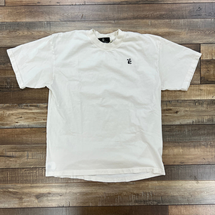 Preowned Hellstar Basic T-Shirt white crew neck with small logo on chest laid flat on wooden floor