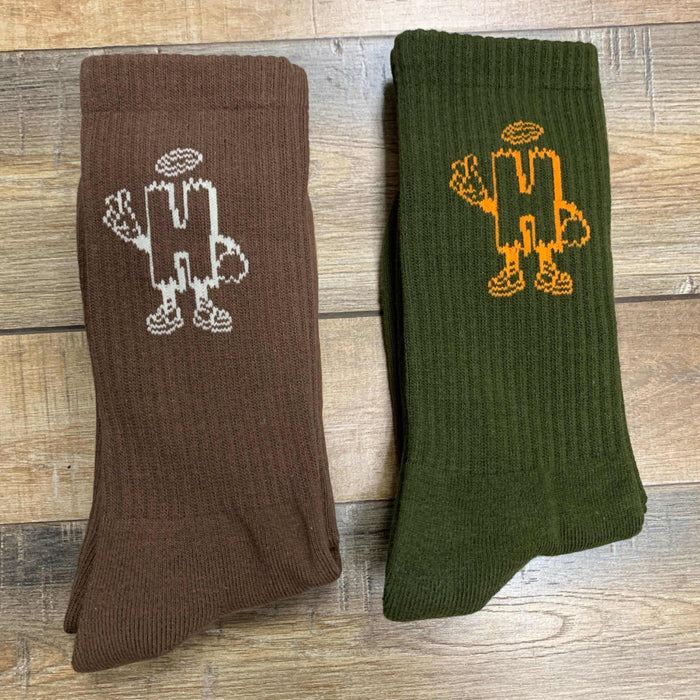 Holy Ground Socks in brown and green with embroidered designs, offering comfort and spiritual connection.