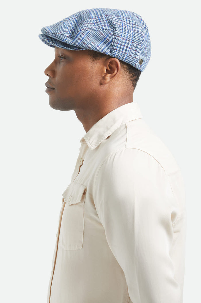 Unisex Hooligan Flat Cap in the color Celadon Green/Royal Plaid - Men's Side View