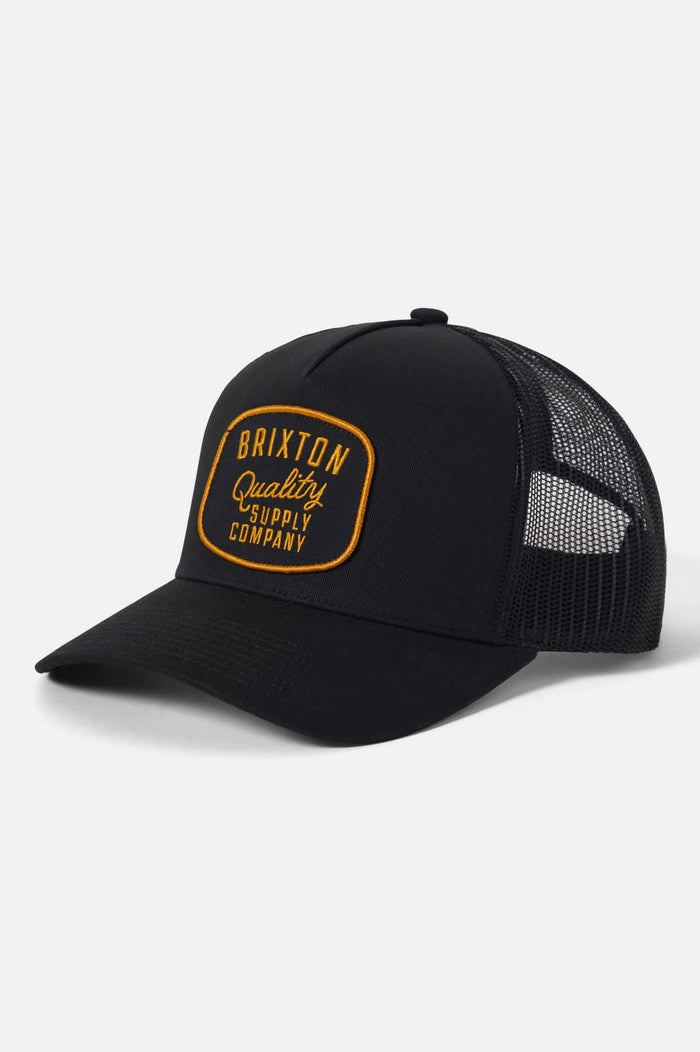 Unisex Hubal NetPlus Trucker Hat in the color Black/Black - Front Product View