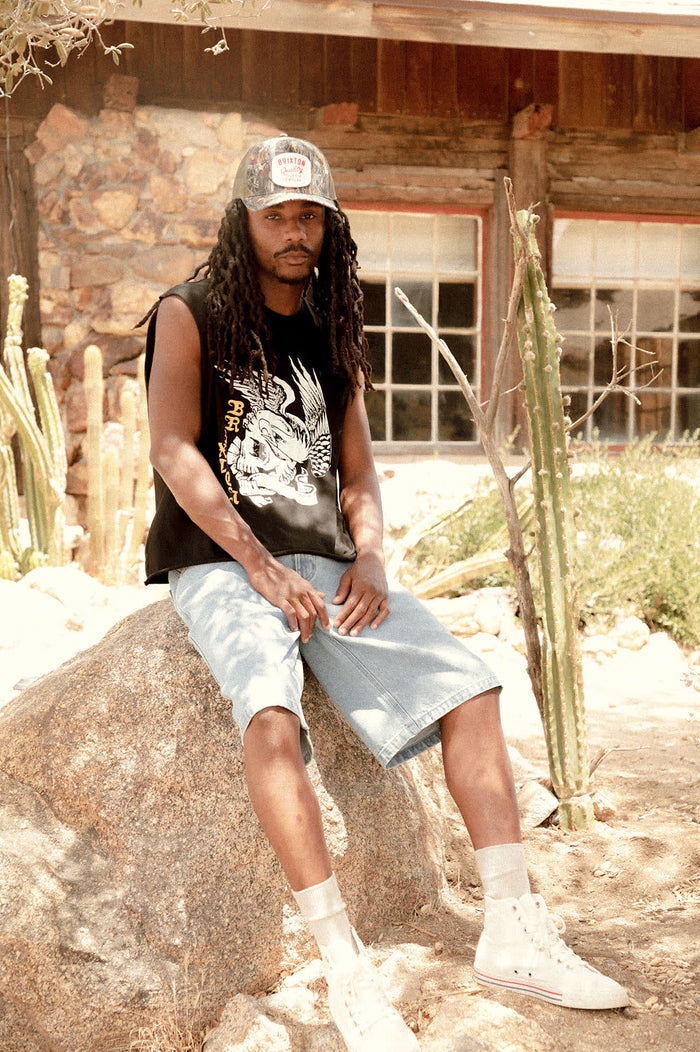 Unisex Hubal Netplus Trucker Hat in the color Tree Camo/Olive - Men's Lifestyle 2.0